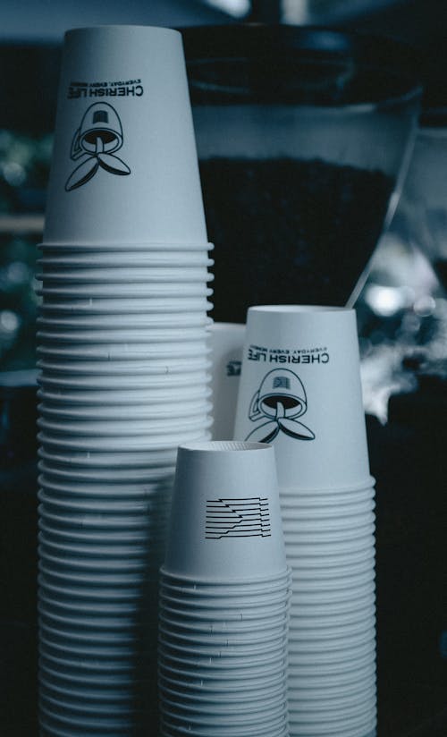 Stacks of White Paper Cups in Close-up Photography