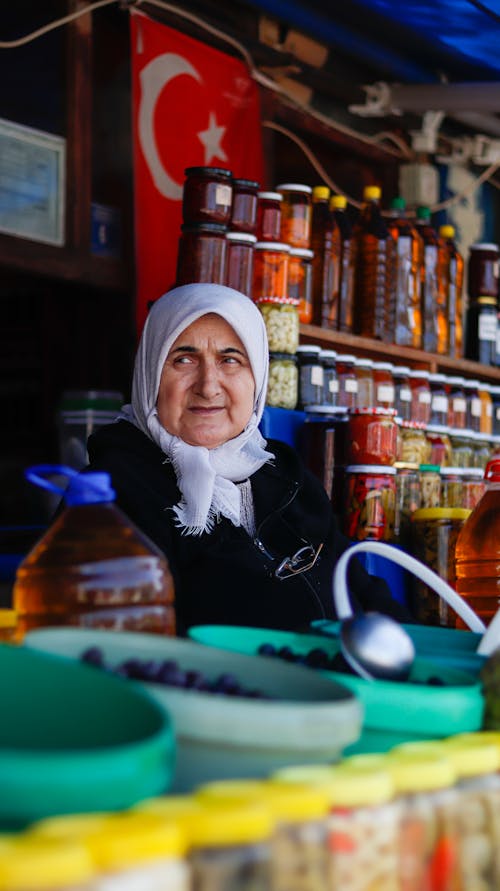 An Elderly Woman Selling in the Market