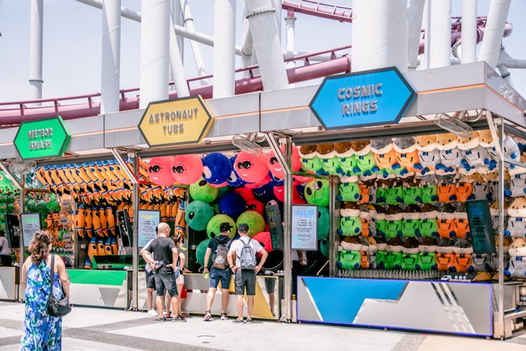 Customers At Toy Booths 