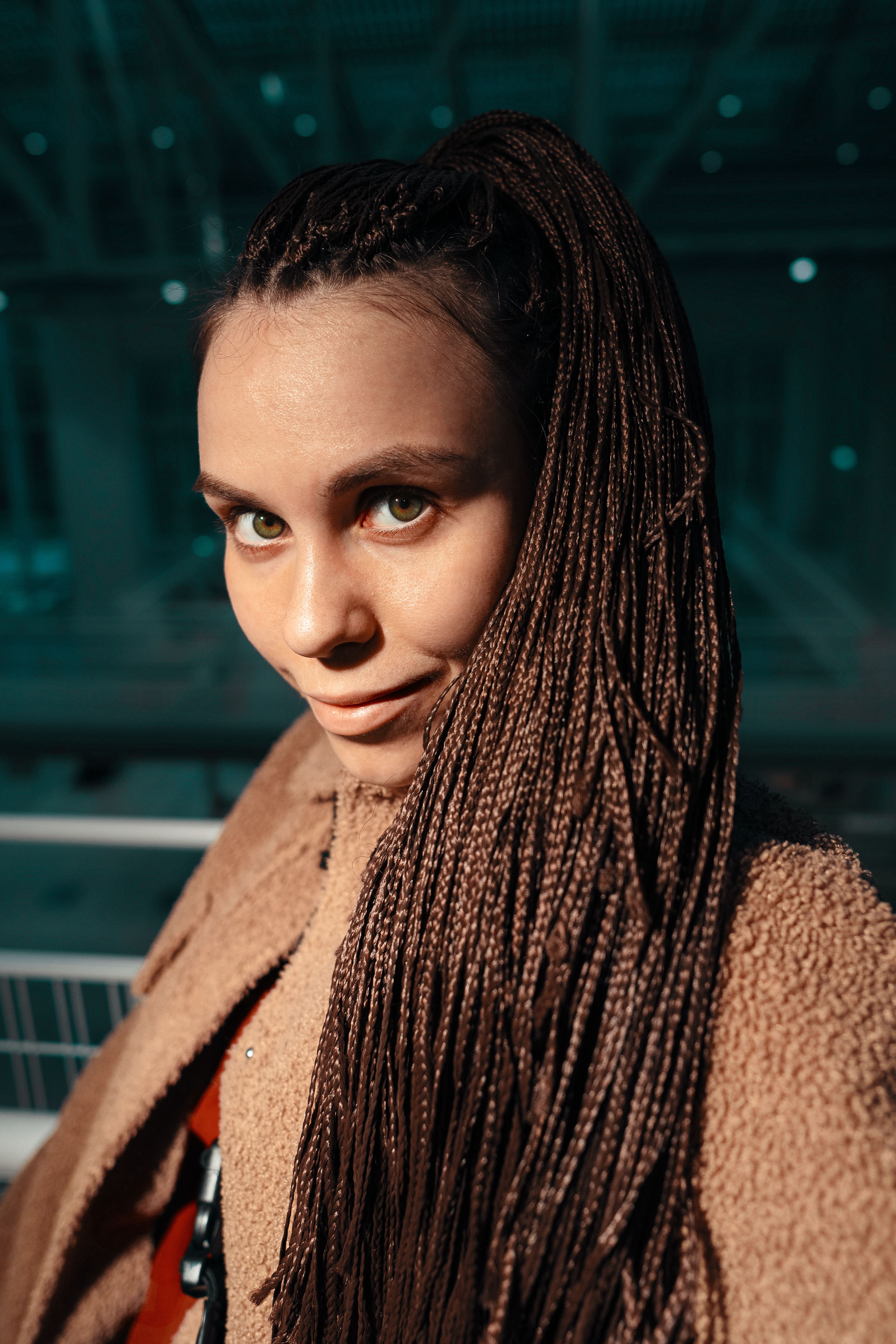 A Woman in Brown Coat Smiling at the Camera · Free Stock Photo