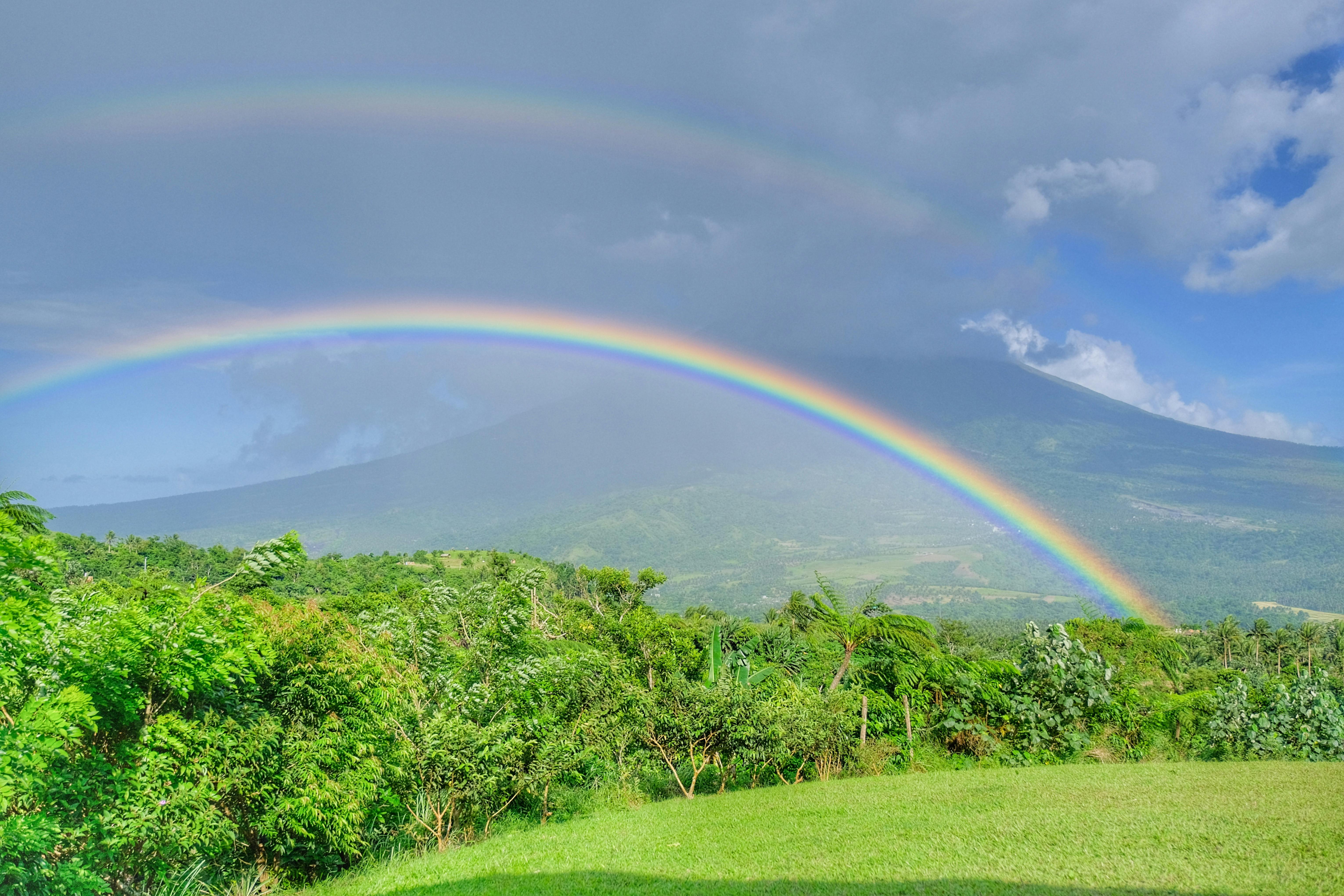 Photo of Rainbow Near Mountain · Free Stock Photo