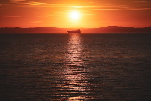 Ingyenes stockfotó hajnal, hajó, nap témában Stockfotó