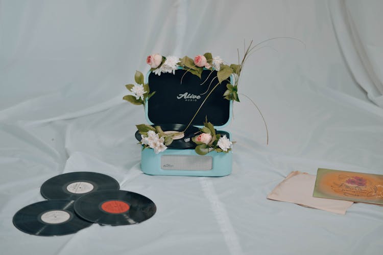 Vintage Record Player And Vinyl Records 