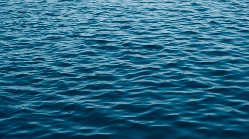Free Close-up view of ocean waves creating beautiful natural wave patterns under the bright daylight. Stock Photo