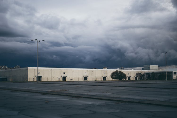 Clouds Over Warehouse Building