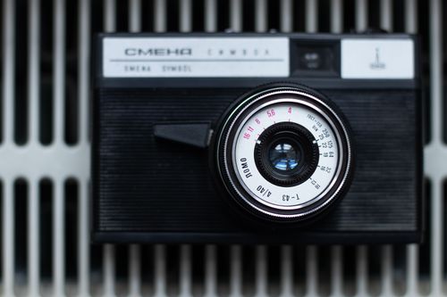 Free Detailed close-up of a classic Smena Symbol camera lens showcasing its vintage design. Stock Photo