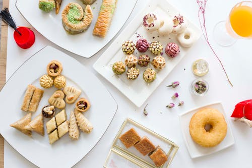 Free Baked Goods on White Plates Stock Photo