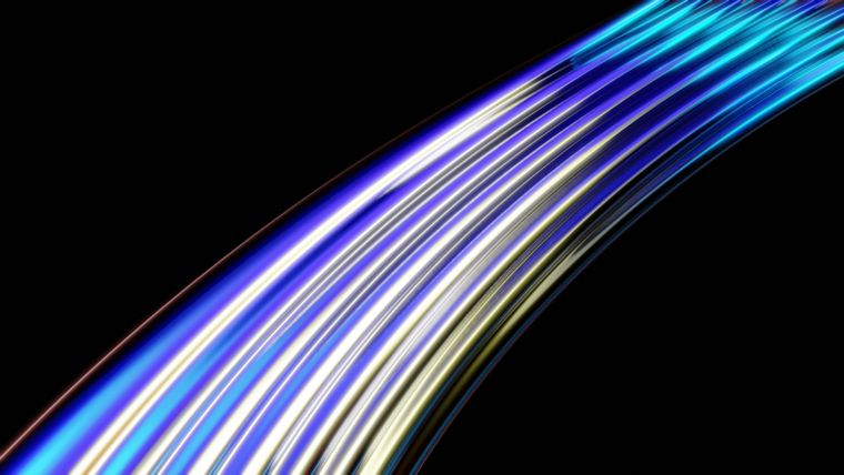 Vibrant curved light trails in blue and yellow on a dark background, d — Photo by Julien Tromeur on Pexels