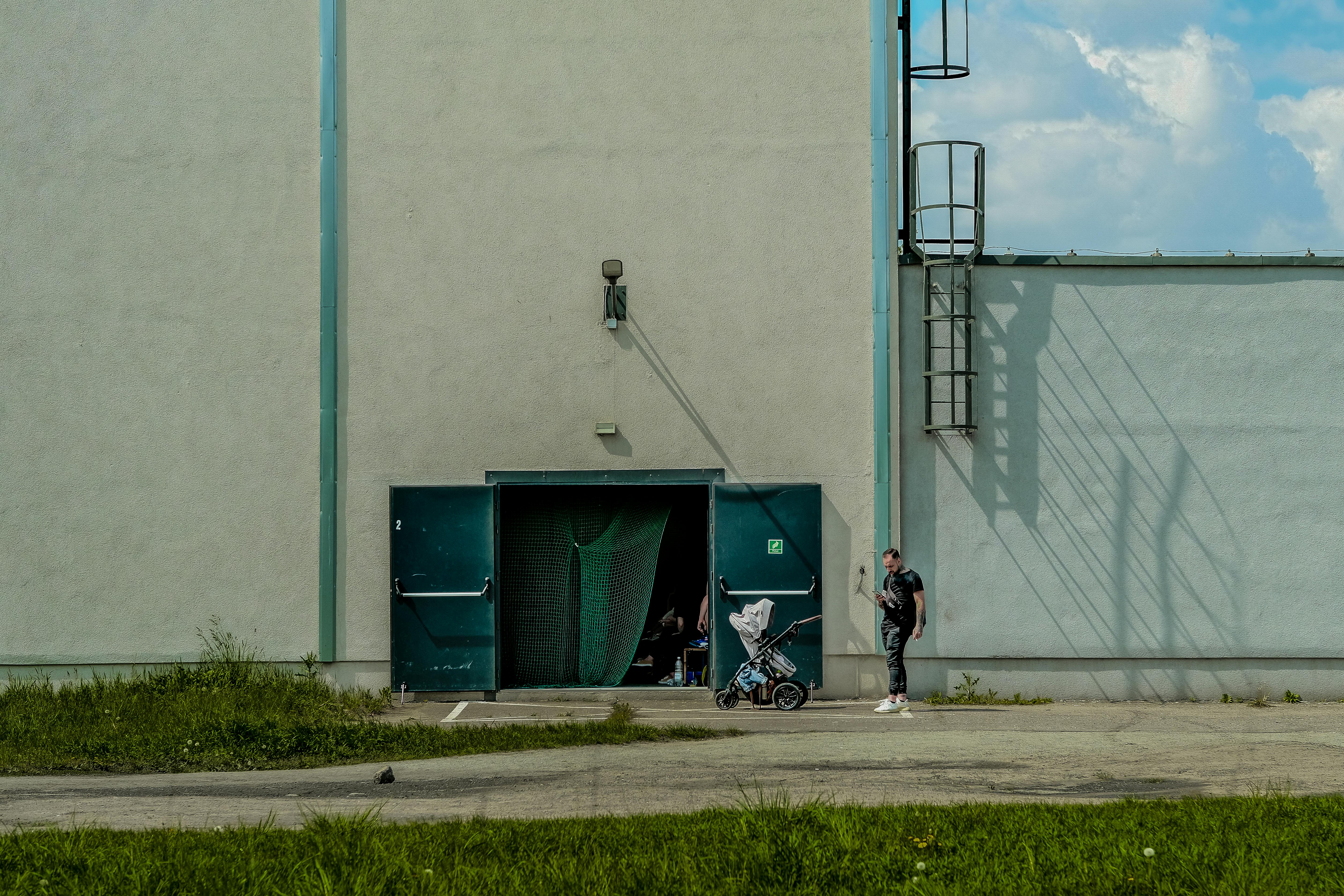 family with stroller boarding public transit - public transport friendly apartments