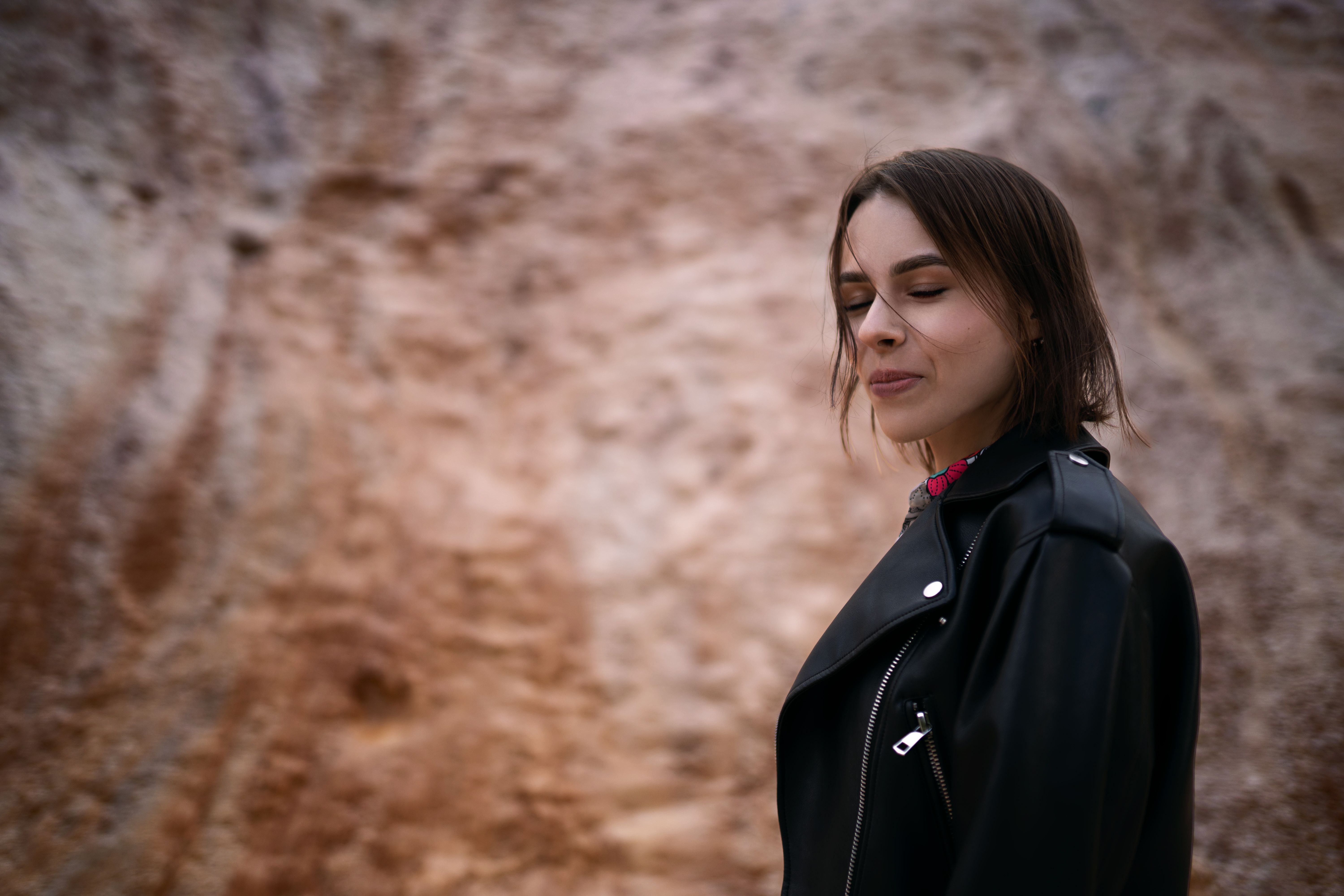 A Woman in Black leather Jacket Smiling · Free Stock Photo