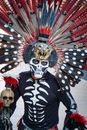 Dancer of Aztec Death Dance in Macabre Disguise