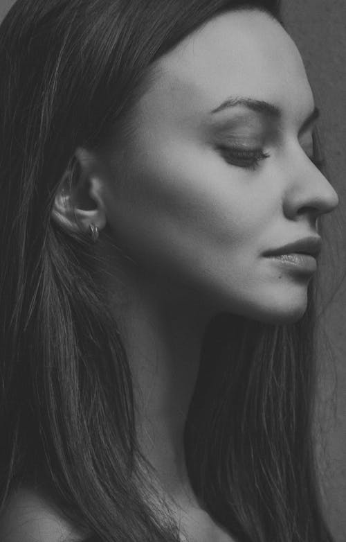 Side View Shot of a Woman Looking Afar