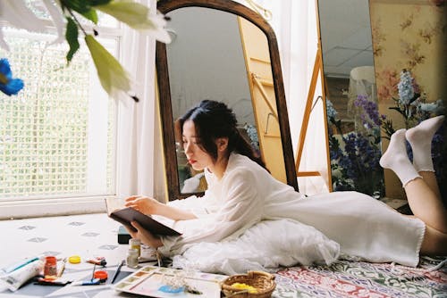 Free A Woman Reading Book Stock Photo