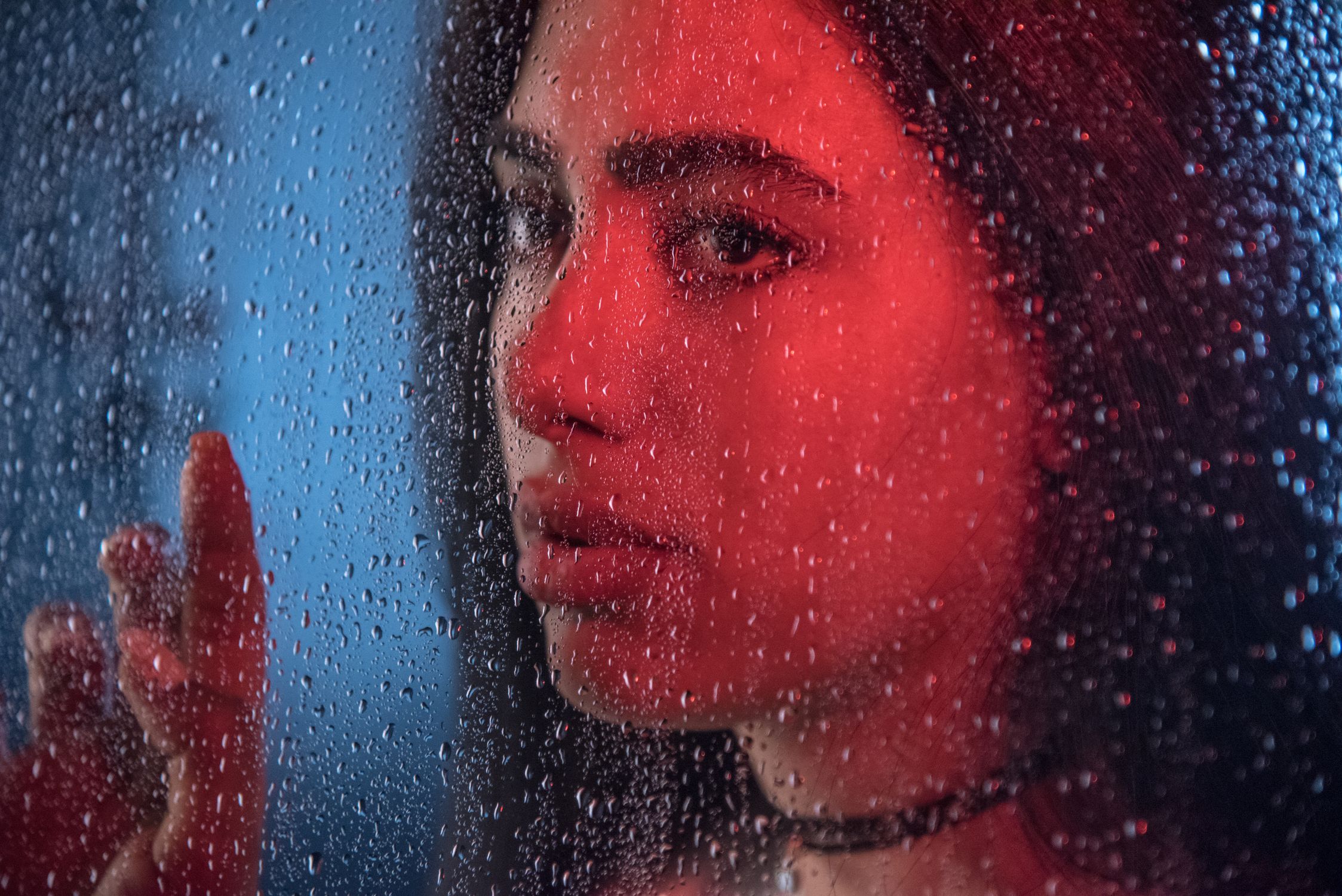A Woman Behind the Glass Window · Free Stock Photo