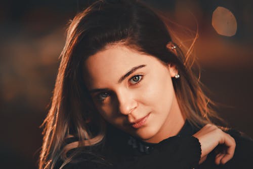 Free Pretty Face of a Young Woman in Close-up Shot Stock Photo