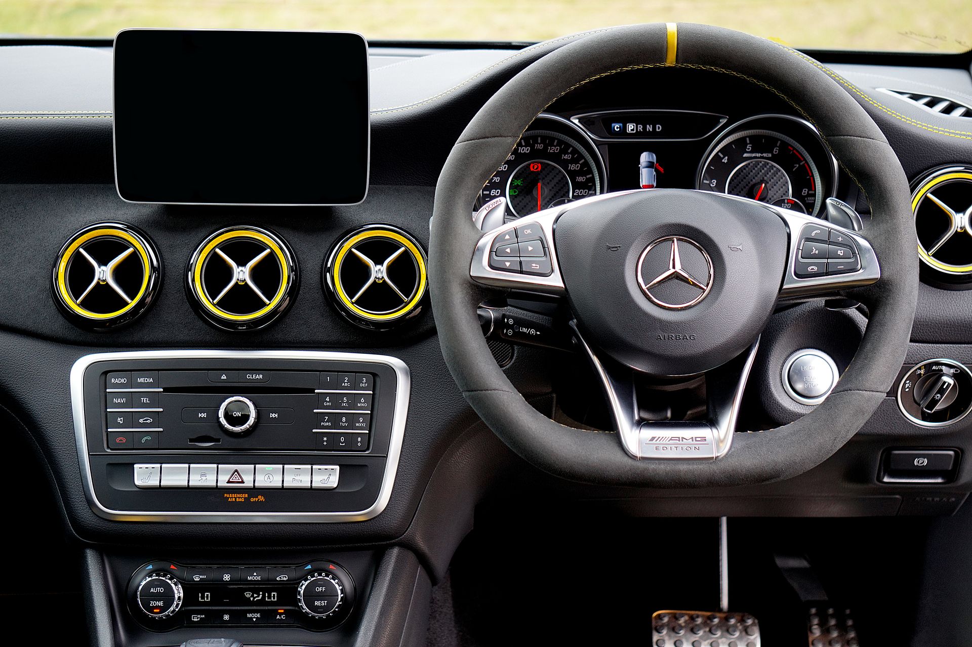 Explore the sleek design and luxury features of a Mercedes Benz car interior, showcasing the dashboard and steering wheel.