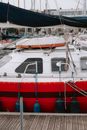 Red and White Boat on Body of Water