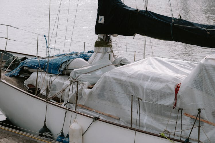 Sailboat In Port With Deck Covered 