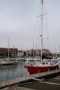 Red and White Boat on Dock