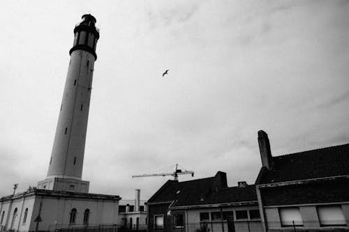 binalar, bulutlar, deniz feneri içeren Ücretsiz stok fotoğraf