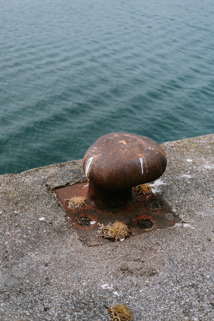 Rusty Cleat On Quay