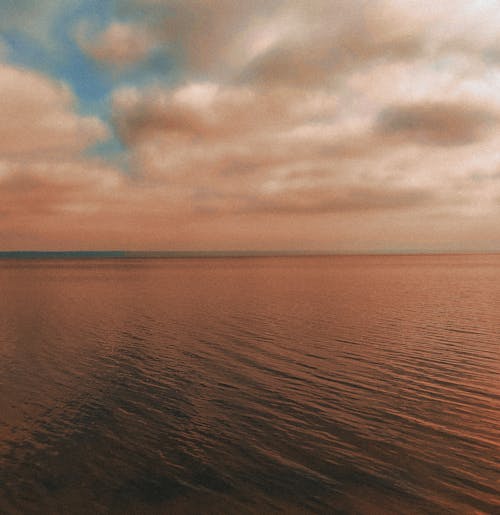 bulutlu gökyüzü, deniz, okyanus içeren Ücretsiz stok fotoğraf