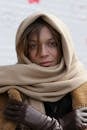 Woman in Brown Scarf and Black Jacket