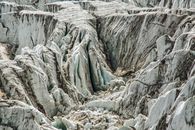 A detailed view of rugged ice crevasses and glacial formations showcasing nature's winter beauty.