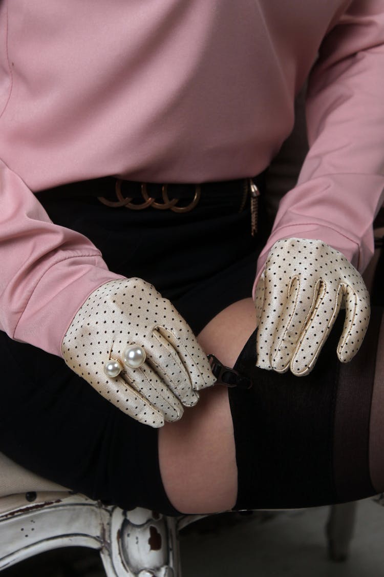 Hands In Silk Gloves Fastening Garter