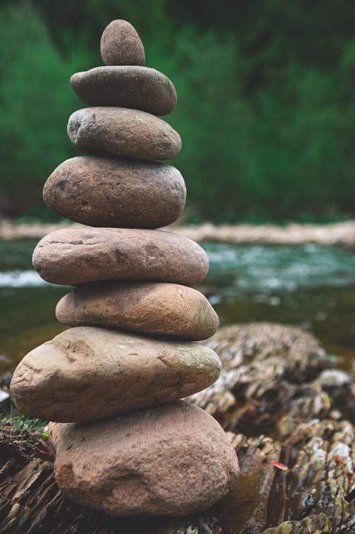 Stone Stacking Beside a River