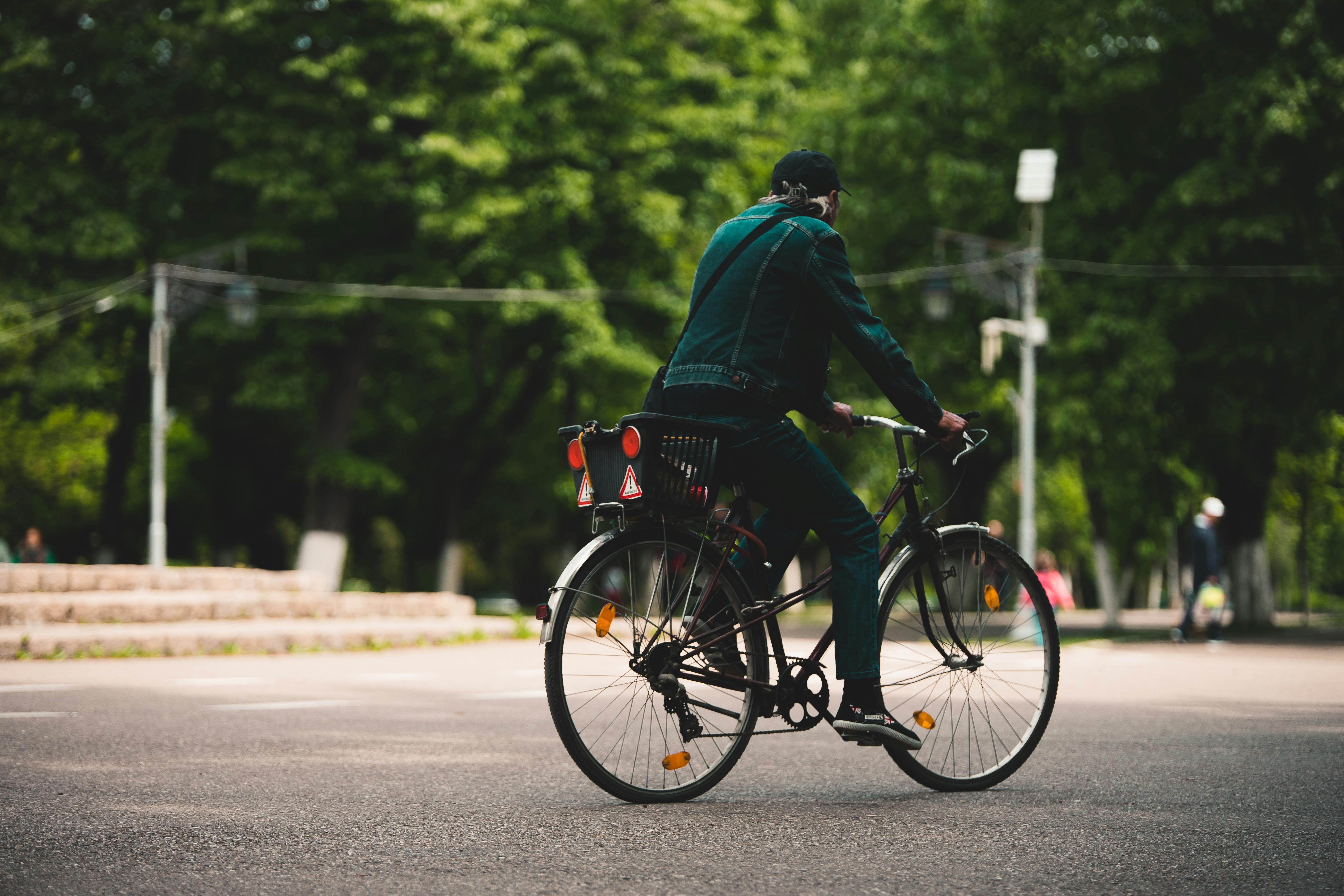 Woman Wearing Bikini Riding a Bike · Free Stock Photo