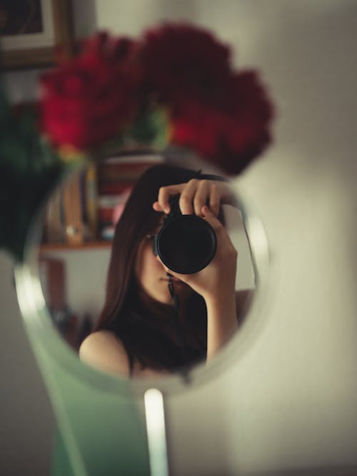 Free Reflection of a Woman on the Mirror Stock Photo