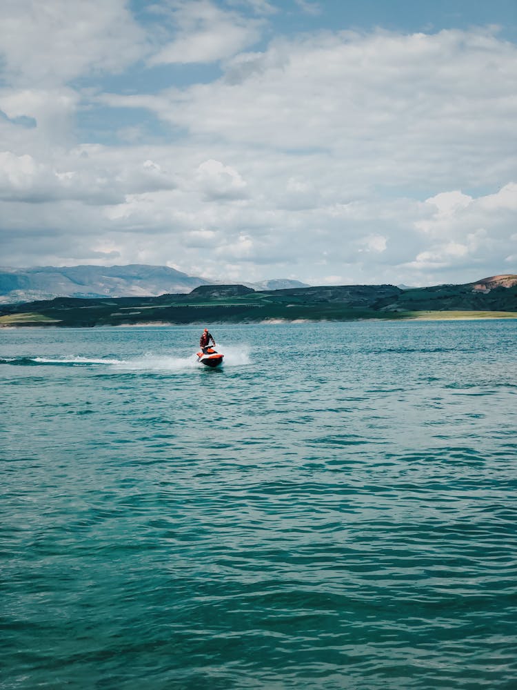 A Person Riding A Jetski