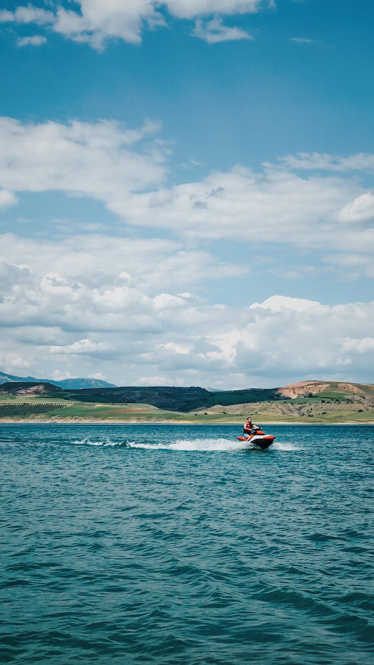 A Person Riding On A Jetski