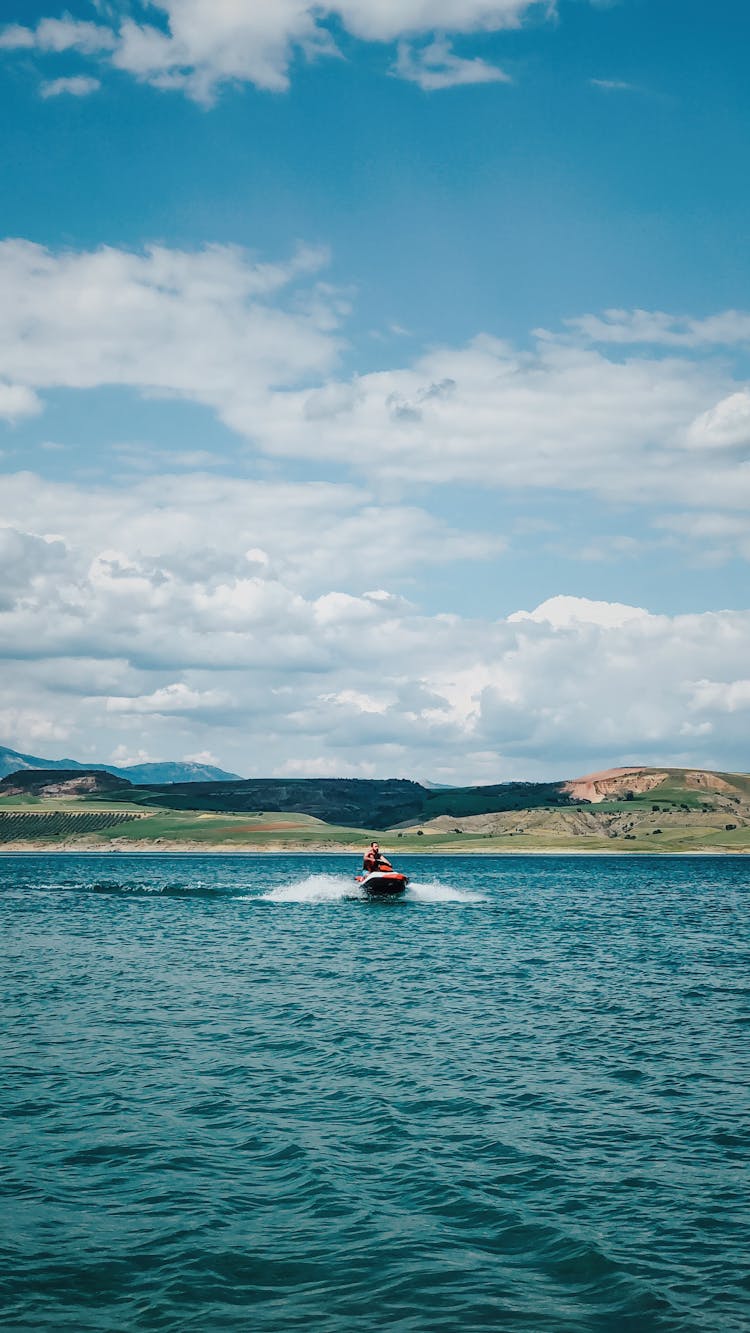 A Person Riding On A Jetski