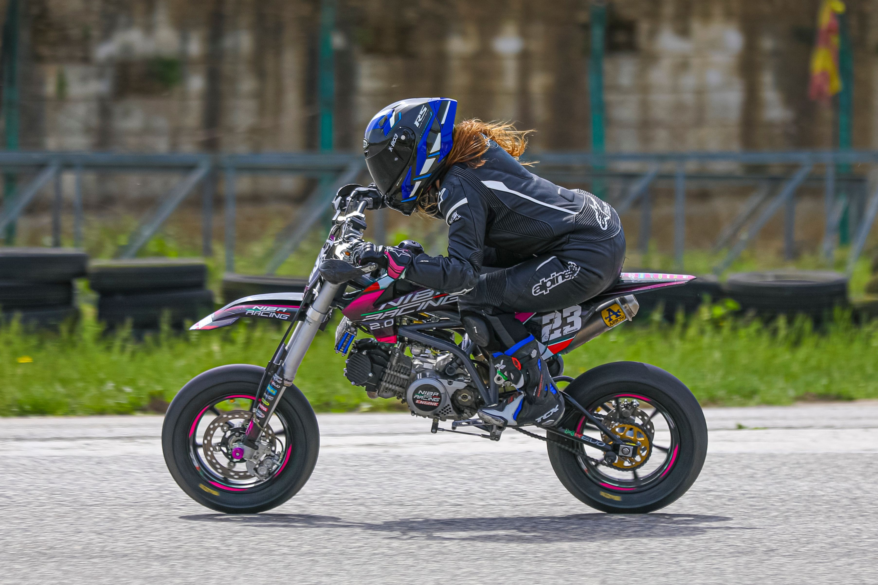 Person Rider A Person Wearing Black Helmet Riding a Motorcycle · Free Stock Photo