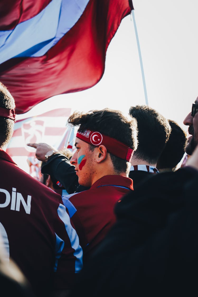 Sports Spectators Holding Flags