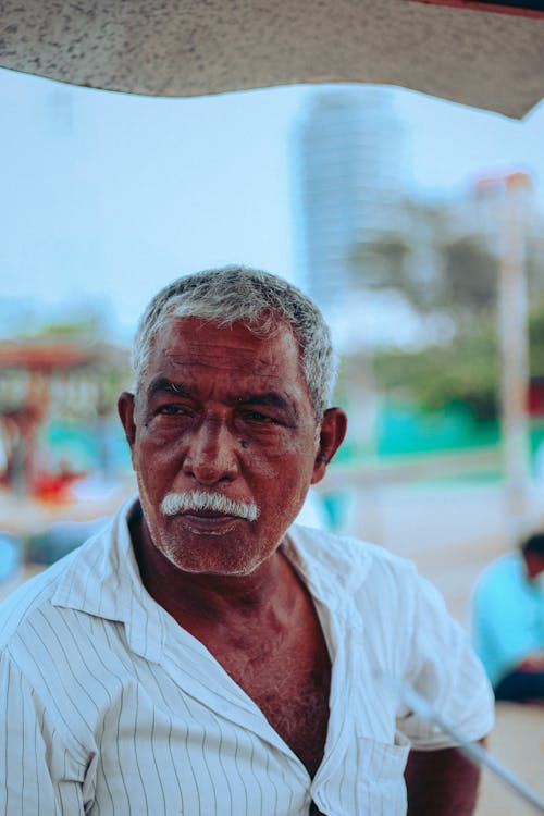 Man Wearing a Button Down Shirt