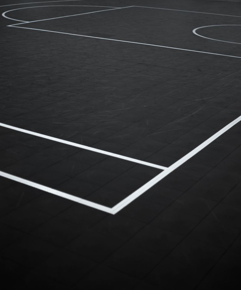 Abstract black and white view of a basketball court with geometric lines
