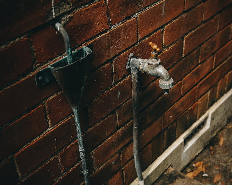 Close-Up Shot Of A Rusty Tap