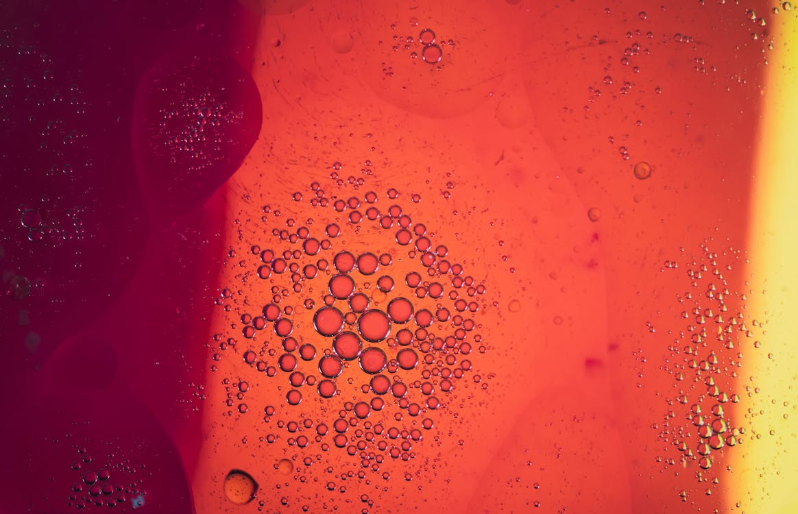 Water Droplets on Red Surface