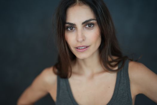 A Woman in Gray Tank Top