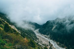 Fog over a mountain valley. Photo by Evgeny Kochurov on Pexels