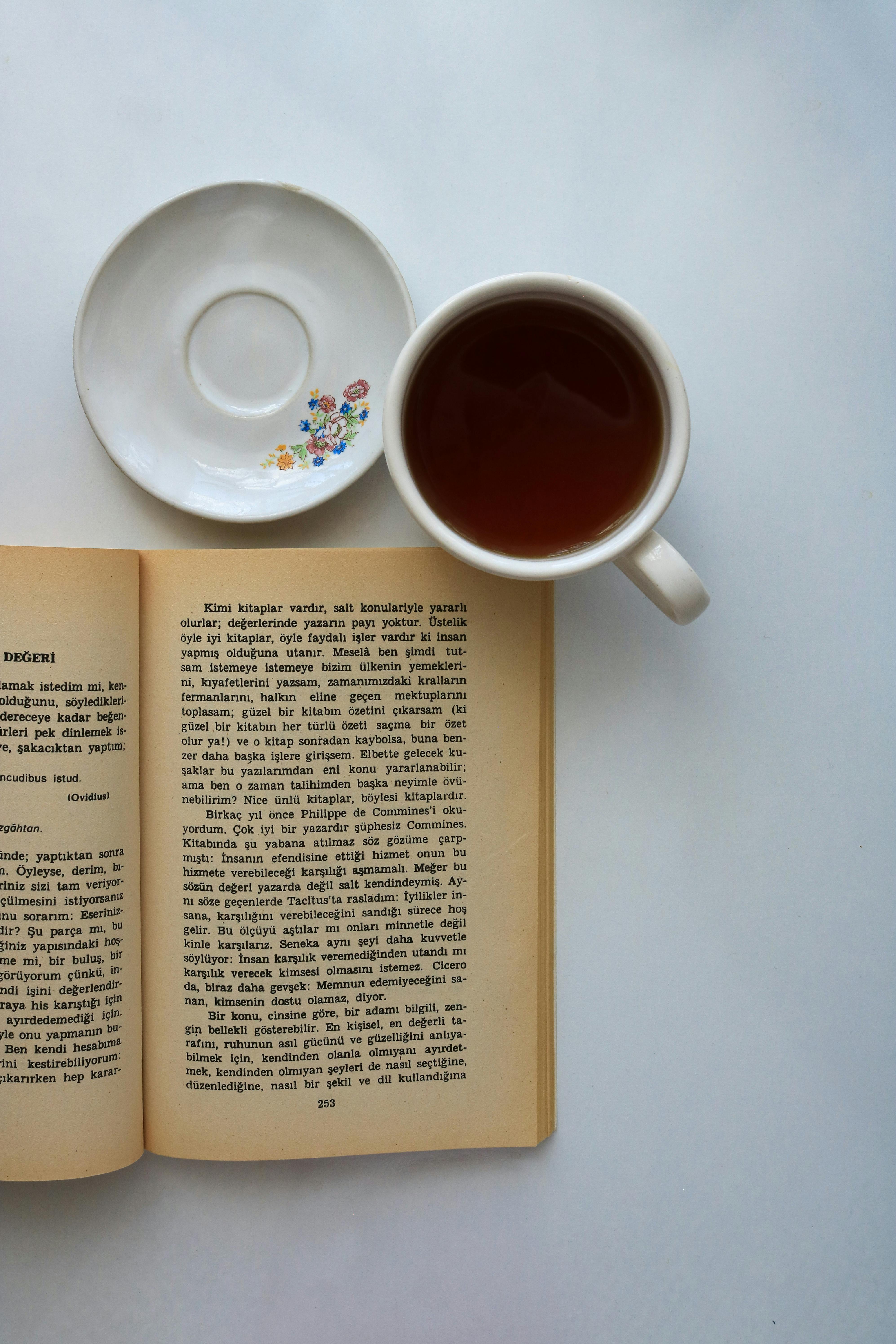 Aesthetic Coffee or Tea Mug on Book Stack | Poster