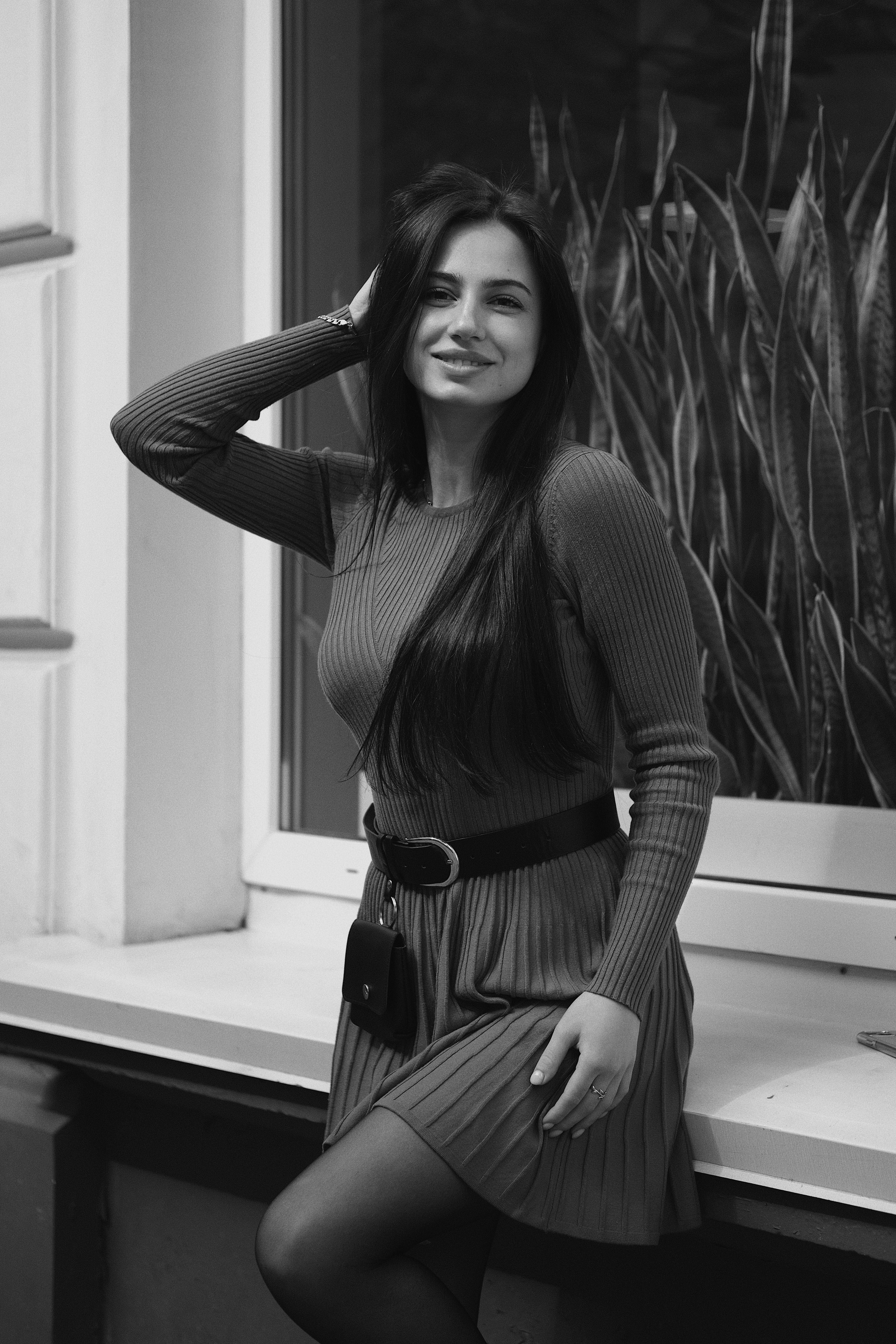 Grayscale Photo of a Woman in Gray Dress Posing · Free Stock Photo