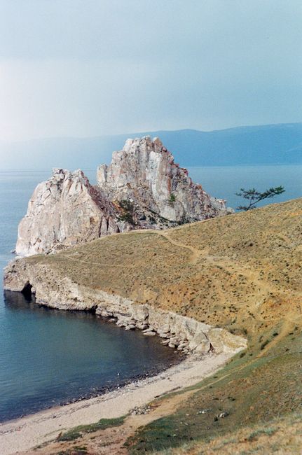 Beautiful coastal cliff on Olkhon Island, Russia with blue sea backdrop. Perfect for travel and nature enthusiasts.