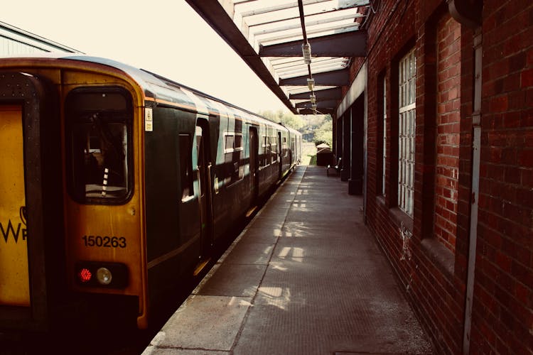 Yellow Train On Railway