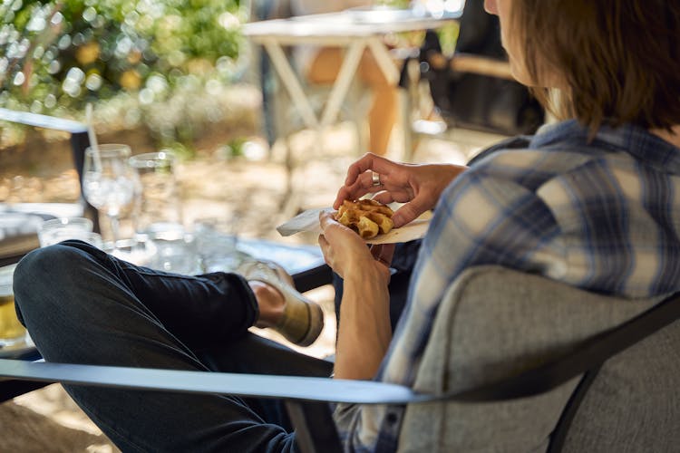 A Person Eating A Cookie