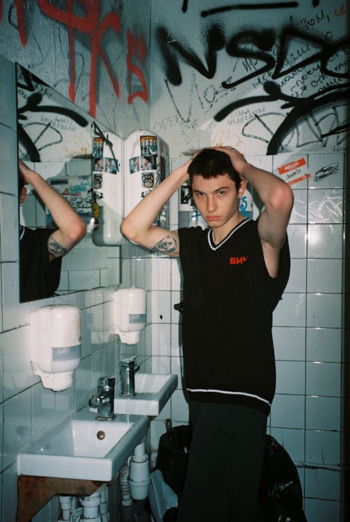 Teenager in Bathroom · Free Stock Photo