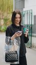 Young Woman Texting on Mobile Phone